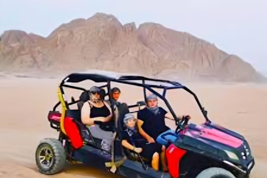 Family quadruple buggy safari in Sharm El Sheikh desert.